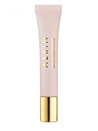 Meet your new beauty essential. This pretty nude shade provides the perfect kiss of color for every skin tone or adds polish layered over lipstick. Plus, intensive skin conditioners help nourish and repair lips all day long and AERIN's signature rose scent brings a sense of calm. Don't leave home without it. Made in Canada. 