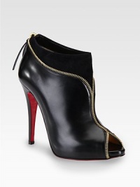 Zipper trim adds urban edge to this elevated peep toe silhouette of smooth leather and suede. Self-covered heel, 4½ (115mm)Leather and suede upper with zipper trimPeep toeBack zipLeather liningSignature red leather solePadded insoleMade in Italy Zipper trim adds urban edge to this elevated peep toe silhouette of smooth leather and suede. Self-covered heel, 4½ (115mm)Leather and suede upper with zipper trimPeep toeBack zipLeather liningSignature red leather solePadded insoleMade in Italy