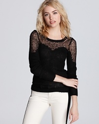 This cozy Free People sweater takes on a sweeter side with the addition of a sheer, contoured sweetheart neckline. This cozy Free People sweater takes on a sweeter side with the addition of a sheer, contoured sweetheart neckline.