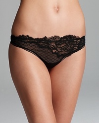 With fishnet mesh and intricate lace work, you'll wish this Calvin Klein Underwear thong came in a dress. Style #F3543. With fishnet mesh and intricate lace work, you'll wish this Calvin Klein Underwear thong came in a dress. Style #F3543.