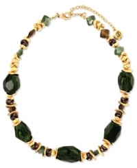 Green and gold creates a lovely necklace from Jones New York. The all-around design boasts resin and plastic beads in varying shapes. Crafted in worn gold tone mixed metal. Approximate length: 17 inches + 2-inch extender. Green and gold creates a lovely necklace from Jones New York. The all-around design boasts resin and plastic beads in varying shapes. Crafted in worn gold tone mixed metal. Approximate length: 17 inches + 2-inch extender.