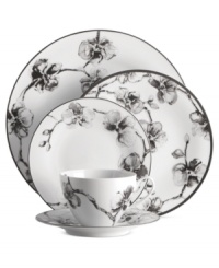 Compose a striking arrangement with the Black Orchid place setting by Michael Aram. Fine white Limoges porcelain flourishes under a dark watercolor motif inspired by foliage from around the world. Compose a striking arrangement with the Black Orchid place setting by Michael Aram. Fine white Limoges porcelain flourishes under a dark watercolor motif inspired by foliage from around the world.