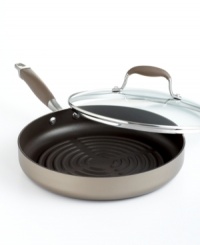 Unbeatable construction, unrivaled performance... brilliant bronze is the chef's choice. A generous size makes room for a family-sized meal-a batch of burgers, a few fillets and more-that cooks up fast on the nonstick interior of this hard-anodized aluminum pan. A true favorite, the grill pan features a channel on the outer edge to collect excess fats that have cooked off. Limited lifetime warranty. Unbeatable construction, unrivaled performance... brilliant bronze is the chef's choice. A generous size makes room for a family-sized meal-a batch of burgers, a few fillets and more-that cooks up fast on the nonstick interior of this hard-anodized aluminum pan. A true favorite, the grill pan features a channel on the outer edge to collect excess fats that have cooked off. Limited lifetime warranty.