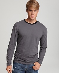 Long sleeve ringer tee with solid, contrast collar. Soft cotton for a nice, comfortable fit. Long sleeve ringer tee with solid, contrast collar. Soft cotton for a nice, comfortable fit.