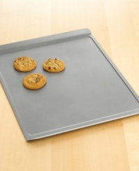 Bake a sizable batch of gooey chocolate chip or moist oatmeal raisin cookies with this large cookie sheet. Features include nonstick interiors and exteriors for easy cleaning, no-hassle food release and optimum baking performance. Large cookie sheet pictured on bottom. Lifetime warranty. Bake a sizable batch of gooey chocolate chip or moist oatmeal raisin cookies with this large cookie sheet. Features include nonstick interiors and exteriors for easy cleaning, no-hassle food release and optimum baking performance. Large cookie sheet pictured on bottom. Lifetime warranty.