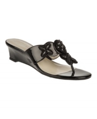 The Kyros wedge sandals by Etienne Aigner embellish your look with their rhinestone-detailed straps and versatile wedge heel. The Kyros wedge sandals by Etienne Aigner embellish your look with their rhinestone-detailed straps and versatile wedge heel.