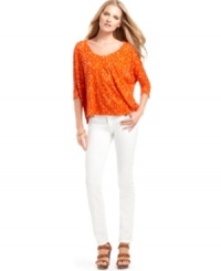 A bright abstract print makes this boxy MICHAEL Michael Kors top a hot pick for a casual summer look! A bright abstract print makes this boxy MICHAEL Michael Kors top a hot pick for a casual summer look!