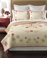 A smattering of fanciful florals and leaves sits upon a landscape of quilted beauty in this Cabin Flowers quilt from Martha Stewart Collection. A touch of classic red offers a charming touch. A smattering of fanciful florals and leaves sits upon a landscape of quilted beauty in this Cabin Flowers quilt from Martha Stewart Collection. A touch of classic red offers a charming touch.