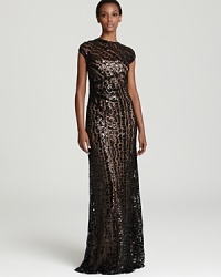 Refreshingly modern yet possessing timeless glamour, this David Meister gown showcases a pattern of sparkling, geometric sequin squares. Refreshingly modern yet possessing timeless glamour, this David Meister gown showcases a pattern of sparkling, geometric sequin squares.