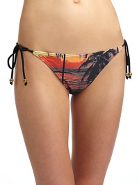 THE LOOKTropical palm printElastic top and leg openingsSide tiesTHE MATERIAL80% nylon/20% spandexFully linedCARE & ORIGINHand washImportedPlease note: Bikini top sold separately. THE LOOKTropical palm printElastic top and leg openingsSide tiesTHE MATERIAL80% nylon/20% spandexFully linedCARE & ORIGINHand washImportedPlease note: Bikini top sold separately.