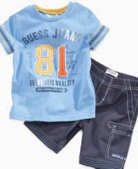 A classic combo. He'll have effortless, all-around style with this t-shirt and cargo short set from Guess. A classic combo. He'll have effortless, all-around style with this t-shirt and cargo short set from Guess.