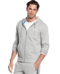 When you're headed out or just around the house, grab this adidas track jacket for classic sporty comfort. When you're headed out or just around the house, grab this adidas track jacket for classic sporty comfort.