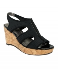 At the corner of cute and comfort. A shiny patent accent along the vamp of the Clint platform sandals by Adrenne Vittadini adds pizzaz to the super soft mesh material. At the corner of cute and comfort. A shiny patent accent along the vamp of the Clint platform sandals by Adrenne Vittadini adds pizzaz to the super soft mesh material.