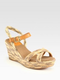 Supple leather joins braided hemp and soft linen lining in this timeless slingback espadrille design. Hemp wedge, 3 (75mm)Hemp platform, 1 (25mm)Compares to a 2 heel (50mm)Hemp and leather upperLinen liningRubber solePadded insoleImportedOUR FIT MODEL RECOMMENDS ordering true whole size; ½ sizes should order the next whole size down. Supple leather joins braided hemp and soft linen lining in this timeless slingback espadrille design. Hemp wedge, 3 (75mm)Hemp platform, 1 (25mm)Compares to a 2 heel (50mm)Hemp and leather upperLinen liningRubber solePadded insoleImportedOUR FIT MODEL RECOMMENDS ordering true whole size; ½ sizes should order the next whole size down.