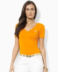The essential petite V-neck tee from Lauren by Ralph Lauren is crafted for stylish comfort in soft cotton jersey with a metallic embroidered monogram for an iconic finish. The essential petite V-neck tee from Lauren by Ralph Lauren is crafted for stylish comfort in soft cotton jersey with a metallic embroidered monogram for an iconic finish.