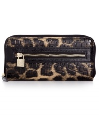 Call of the wild. Get organized in the most exotic way with this posh animal-print wallet from Anne Klein. Ideally sized to slip inside a handbag, it boasts plenty of pockets and compartments for all the essentials. Call of the wild. Get organized in the most exotic way with this posh animal-print wallet from Anne Klein. Ideally sized to slip inside a handbag, it boasts plenty of pockets and compartments for all the essentials.