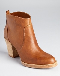 KORS Michael Kors ventures into the wild west with the Wayland booties, a pull-on bootie in rich, tanned leather. KORS Michael Kors ventures into the wild west with the Wayland booties, a pull-on bootie in rich, tanned leather.
