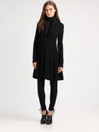 Wrap yourself in the warmth and richness of a traditional Aran knit in luxuriously soft cotton, interwoven with Lurex for a touch of shimmer.Draped shawl collarOpen front with kilt pin fastenerLong sleeves with ribbed cuffsFitted at back waistFlared hemAbout 34 from shoulder to hemCottonDry cleanImportedSIZE & FITModel shown is 5'10 (177cm) wearing US size Small. This style runs true to size. Wrap yourself in the warmth and richness of a traditional Aran knit in luxuriously soft cotton, interwoven with Lurex for a touch of shimmer.Draped shawl collarOpen front with kilt pin fastenerLong sleeves with ribbed cuffsFitted at back waistFlared hemAbout 34 from shoulder to hemCottonDry cleanImportedSIZE & FITModel shown is 5'10 (177cm) wearing US size Small. This style runs true to size.
