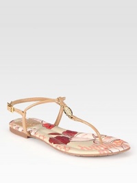 Leather logo-embellished t-strap rests upon a printed footbed, while an adjustable slingback strap holds the foot in place. Leather upperLeather liningRubber solePadded insoleImportedOUR FIT MODEL RECOMMENDS ordering true size. Leather logo-embellished t-strap rests upon a printed footbed, while an adjustable slingback strap holds the foot in place. Leather upperLeather liningRubber solePadded insoleImportedOUR FIT MODEL RECOMMENDS ordering true size.