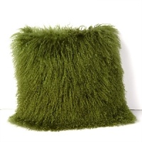 Add a decadent touch to your bed with this shaggy Sky decorative pillow in opulently shaggy sheep fur.