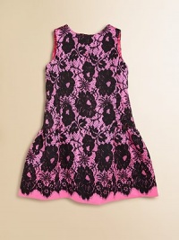 A dramatic silhouette finished with romantic details like a gorgeous back bow and allover lace print.Jewel necklineSleevelessConcealed back zip closureBack bow detailDrop waist skirt56% wool/44% silkDry cleanMade in USA of imported fabric A dramatic silhouette finished with romantic details like a gorgeous back bow and allover lace print.Jewel necklineSleevelessConcealed back zip closureBack bow detailDrop waist skirt56% wool/44% silkDry cleanMade in USA of imported fabric