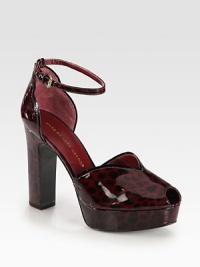 A sexy platform silhouette of spotted patent leather with an adjustable ankle strap and contrast trim. Self-covered heel, 4½ (115mm)Covered platform, 1¼ (30mm)Compares to a 3¼ heel (80mm)Patent leather upperAdjustable ankle strapPeep toeLeather lining and solePadded insoleImportedThis style runs true to size. We recommend ordering your usual size for a standard fit. A sexy platform silhouette of spotted patent leather with an adjustable ankle strap and contrast trim. Self-covered heel, 4½ (115mm)Covered platform, 1¼ (30mm)Compares to a 3¼ heel (80mm)Patent leather upperAdjustable ankle strapPeep toeLeather lining and solePadded insoleImportedThis style runs true to size. We recommend ordering your usual size for a standard fit.