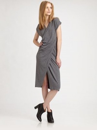Supremely soft scoopback dress has a crossover v-neck, asymmetrical draping and a sultry front slit. Crossover v-neckShort sleevesFront slitScoopbackAbout 22 from natural waist52% viscose/22% polyamide/18% wool/8% elastaneDry cleanMade in ItalyModel shown is 5'10 (177cm) wearing US size Small. Supremely soft scoopback dress has a crossover v-neck, asymmetrical draping and a sultry front slit. Crossover v-neckShort sleevesFront slitScoopbackAbout 22 from natural waist52% viscose/22% polyamide/18% wool/8% elastaneDry cleanMade in ItalyModel shown is 5'10 (177cm) wearing US size Small.