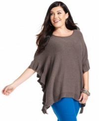 Stay chic and warm in Alfani's plus size poncho, beautifully accented by ruffled edges. Stay chic and warm in Alfani's plus size poncho, beautifully accented by ruffled edges.