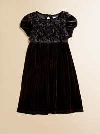 Rows of beautiful rosettes adorn the bodice of this charming velour frock for a look that's almost as pretty as your little girl.Round necklineCap sleevesBack keyhole buttonHigh-waisted90% polyester/10% spandexMachine washImported Rows of beautiful rosettes adorn the bodice of this charming velour frock for a look that's almost as pretty as your little girl.Round necklineCap sleevesBack keyhole buttonHigh-waisted90% polyester/10% spandexMachine washImported