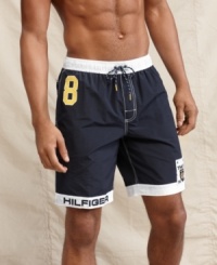 Captain your poolside style with these yachting inspired swim shorts from Tommy Hilfiger. Captain your poolside style with these yachting inspired swim shorts from Tommy Hilfiger.