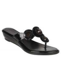 The Etienne Aigner Bacia Sandals add a little twinkle to your looks with their beaded straps and versatile wedge heel. The Etienne Aigner Bacia Sandals add a little twinkle to your looks with their beaded straps and versatile wedge heel.