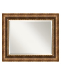 Grand and radiant like the city that never sleeps, the Manhattan wall mirror features a burnished bronze frame with beaded trim and beveled glass interior. Outfit your home office or master bedroom for timeless good looks and masculine appeal.