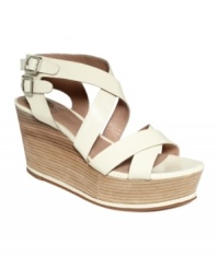 Chunky straps take the on-trend Giada flatform wedges by Vince Camuto to an over-the-top place. Pair them with a pair of shorts for a funky, fun look.