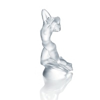 In 2010, to celebrate the 150th anniversary of René Lalique's birth in 1860, LALIQUE created the Hommage à René Lalique collection. In this collection, Lalique re-examines and reinterprets iconic glass creations of Rene Lalique. Created in 1929 by René Lalique, the Vitesseradiator cap is one of his most beautiful mascots. As an allegory of speed, this woman figure takes life in the satin-finished and shiny crystal.In 1925, Rene Lalique started the design of 27 car Mascots out of glass for the prestigious vehicles of time. The Vitesse is one of the most stunning of these figurines and is eagerly sought after today by collectors throughout the world. In 2010, to celebrate the 150th anniversary of René Lalique's birth in 1860, LALIQUE created the Hommage à René Lalique collection. In this collection, Lalique re-examines and reinterprets iconic glass creations of Rene Lalique. Created in 1929 by René Lalique, the Vitesseradiator cap is one of his most beautiful mascots. As an allegory of speed, this woman figure takes life in the satin-finished and shiny crystal.In 1925, Rene Lalique started the design of 27 car Mascots out of glass for the prestigious vehicles of time. The Vitesse is one of the most stunning of these figurines and is eagerly sought after today by collectors throughout the world.