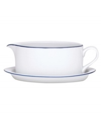 Named for a trendy Copenhagen neighborhood but designed with timeless style, the Christianshavn Blue gravy boat and stand feature double bands of navy in pristine white porcelain. From Dansk.