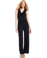 A cowl neckline and self-tie waist add a unique twist to a must-have jumpsuit from MICHAEL Michael Kors. Dress it up or down with just the right accessories. A cowl neckline and self-tie waist add a unique twist to a must-have jumpsuit from MICHAEL Michael Kors. Dress it up or down with just the right accessories.