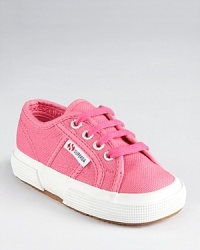 Superga's enduring classic sneakers elevate their day-to-day wardrobe with tasteful details and quality construction. Superga's enduring classic sneakers elevate their day-to-day wardrobe with tasteful details and quality construction.