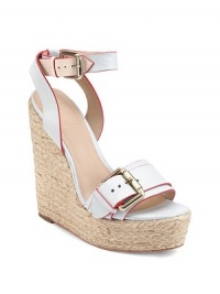 THE LOOKOpen toe Leather straps with contrast trim and goldtone buckles Adjustable ankle strapTHE FITRope-trim wedge heel, 6 (150mm) Rope-trim platform, 1¾ (45mm) Compares to a 4¼ heel (110mm)THE MATERIALLeather lining and sole Padded insoleORIGINImported THE LOOKOpen toe Leather straps with contrast trim and goldtone buckles Adjustable ankle strapTHE FITRope-trim wedge heel, 6 (150mm) Rope-trim platform, 1¾ (45mm) Compares to a 4¼ heel (110mm)THE MATERIALLeather lining and sole Padded insoleORIGINImported