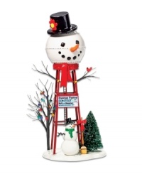 Advertising a Snowman Festival Contest and, with a giant snowman-shaped tank, this festively decked water tower gets the entire Christmas village in the spirit. Advertising a Snowman Festival Contest and, with a giant snowman-shaped tank, this festively decked water tower gets the entire Christmas village in the spirit.