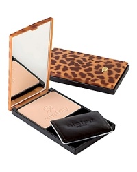 A mattified and luminous complexion, all day long. Moisturizing, emollient, protective and soothing, Phyto-Poudre Compacte envelops the skin with softness and sheer protection, thanks to camellia oil and extracts of mallow and linden. It contains micronized talc, featuring a double coating of silicone (for added glide upon application) and lecithin (for its anti-drying virtues, softness and silky-smooth finish). The double coating preserves skin moisture and maintains color stability and purity all day long.With its supremely fine texture, the powder unifies the complexion with a sheer look, while its spherical beads, combined with silica spheres, absorb excess sebum and provide maximum shine control.Within a few minutes:- The complexion is unified and enhanced.- Skin is smoothed.- Pores are minimized and visibly tightened.- The makeup result is light, natural and transparent.- The finish is velvety-smooth and radiant.- Comfort is optimal.- The skin's natural hydration is preserved.Each compact is uniquely hand-decorated with a stencil. Phyto-Poudre Compacte's ultra-slim case will follow you anywhere, anytime, for discreet retouches during the day. A mattified and luminous complexion, all day long. Moisturizing, emollient, protective and soothing, Phyto-Poudre Compacte envelops the skin with softness and sheer protection, thanks to camellia oil and extracts of mallow and linden. It contains micronized talc, featuring a double coating of silicone (for added glide upon application) and lecithin (for its anti-drying virtues, softness and silky-smooth finish). The double coating preserves skin moisture and maintains color stability and purity all day long.With its supremely fine texture, the powder unifies the complexion with a sheer look, while its spherical beads, combined with silica spheres, absorb excess sebum and provide maximum shine control.Within a few minutes:- The complexion is unified and enhanced.- Skin is smoothed.- Pores are minimized and visibly tightened.- The makeup result is light, natural and transparent.- The finish is velvety-smooth and radiant.- Comfort is optimal.- The skin's natural hydration is preserved.Each compact is uniquely hand-decorated with a stencil. Phyto-Poudre Compacte's ultra-slim case will follow you anywhere, anytime, for discreet retouches during the day.
