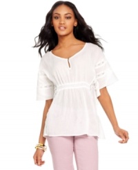 Crinkled cotton and embroidered trim combine in this ultra-boho petite top from DKNY Jeans. Pair it with candy-colored jeans for an instantly on-trend look. Crinkled cotton and embroidered trim combine in this ultra-boho petite top from DKNY Jeans. Pair it with candy-colored jeans for an instantly on-trend look.