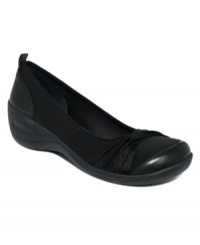 The Karrington wedge pumps by Easy Spirit feature a cozy stretch lining and an ultra lightweight outsole for a fit that can't be beat. The Karrington wedge pumps by Easy Spirit feature a cozy stretch lining and an ultra lightweight outsole for a fit that can't be beat.
