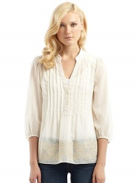 THE LOOKSoft tucks release to a sweeping embroidered hemStand collarGathered full sleevesV-neck with 2-button partial placketDouble-layer shoulder yokeBack gathering for fullnessTHE FITAbout 35 from shoulder to hemTHE MATERIALSemi-sheer meshCottonCARE & ORIGINDry cleanImported THE LOOKSoft tucks release to a sweeping embroidered hemStand collarGathered full sleevesV-neck with 2-button partial placketDouble-layer shoulder yokeBack gathering for fullnessTHE FITAbout 35 from shoulder to hemTHE MATERIALSemi-sheer meshCottonCARE & ORIGINDry cleanImported