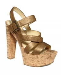 How high do you dare to wear? The Danicio platform sandals by Enzo Angiolini are the height of sizzling style with their metallic leather straps and towering cork platform. How high do you dare to wear? The Danicio platform sandals by Enzo Angiolini are the height of sizzling style with their metallic leather straps and towering cork platform.