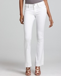 With a bright white wash, these James Jeans flare jeans are an ultra-chic take on denim. With a bright white wash, these James Jeans flare jeans are an ultra-chic take on denim.