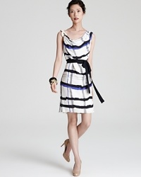 Escada's silk dress with draped cowl neckline flaunts an abstract plaid print and nautical rope detail at shoulder. Escada's silk dress with draped cowl neckline flaunts an abstract plaid print and nautical rope detail at shoulder.