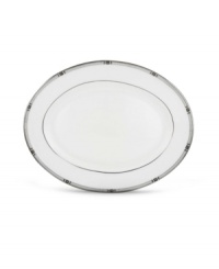 An art deco inspired design, platinum trim and metallic dots lend the Westerly Platinum oval platter sophisticated polish. This versatile collection perfectly coordinates with a variety of stemware and table linens. An art deco inspired design, platinum trim and metallic dots lend the Westerly Platinum oval platter sophisticated polish. This versatile collection perfectly coordinates with a variety of stemware and table linens.