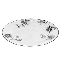 A captivating motif of lifelike orchids stands out in dramatic relief against a backdrop of vibrant white porcelain, giving this dinnerware from Michael Aram bold, artful presence. A captivating motif of lifelike orchids stands out in dramatic relief against a backdrop of vibrant white porcelain, giving this dinnerware from Michael Aram bold, artful presence.
