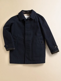 A handsome classic gets a glossy update in waxed linen within a single-breasted, buttonfront silhouette with flap pockets.Shirt-style collarSingle-breasted button frontLong raglan sleeves with button cuffsButtoned flap pocketsCenter-vented back hemPartially linedCottonDry cleanImported Please note: Number of buttons may vary depending on size ordered. A handsome classic gets a glossy update in waxed linen within a single-breasted, buttonfront silhouette with flap pockets.Shirt-style collarSingle-breasted button frontLong raglan sleeves with button cuffsButtoned flap pocketsCenter-vented back hemPartially linedCottonDry cleanImported Please note: Number of buttons may vary depending on size ordered.