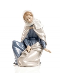 In her simple beauty, Mary peers down adoringly to where baby Jesus lays his head. Recreate the wonder, awe and miracle of Christmas with this delicately handcrafted nativity figurine from Nao by Lladro. In her simple beauty, Mary peers down adoringly to where baby Jesus lays his head. Recreate the wonder, awe and miracle of Christmas with this delicately handcrafted nativity figurine from Nao by Lladro.